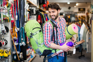 Man buying new outdoor equipment